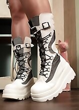 Bailey Jay flaunts her big cock and sexy feet