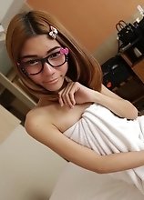 Skinny ladyboy in glasses getting fucked in Bangkok hotel